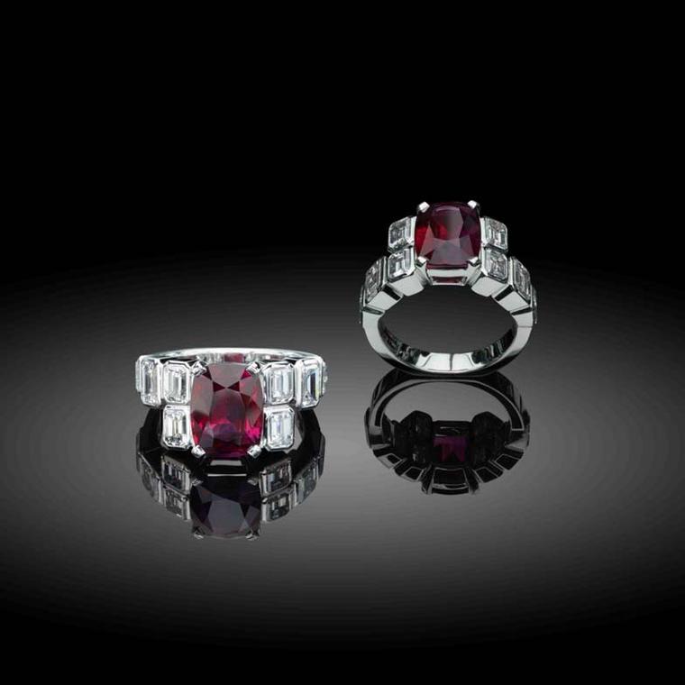Extravagant art deco-style ruby ring from Star Diamond Private Jeweller featuring a deep red African ruby flanked by emerald-cut diamonds.